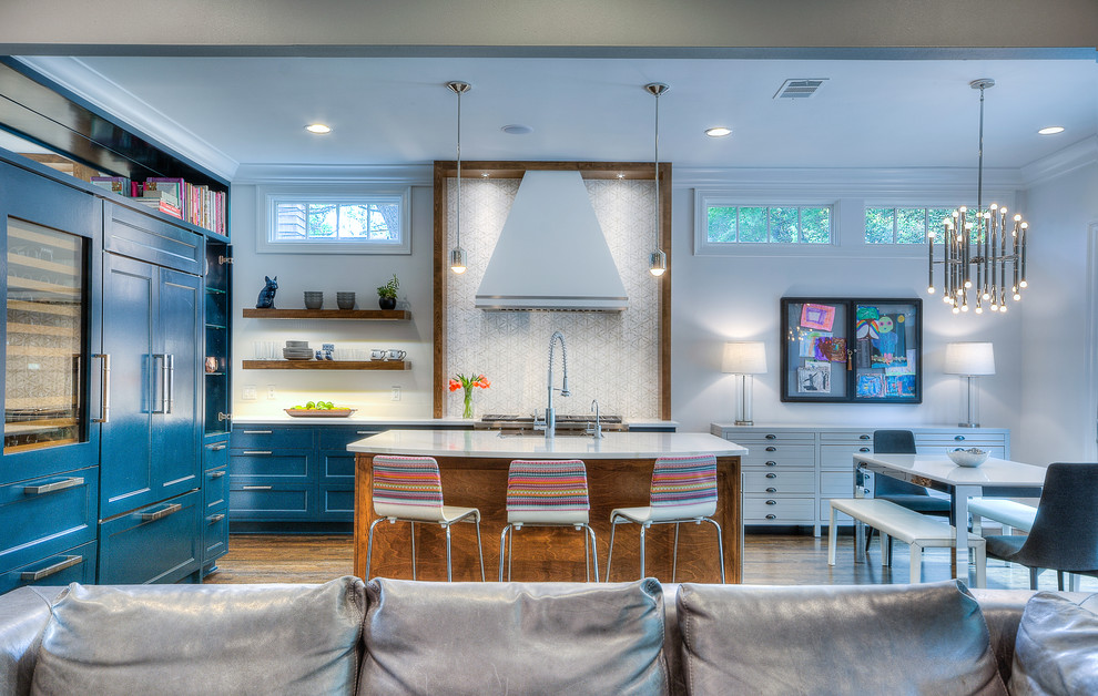 Kitchen - transitional kitchen idea in Austin with white backsplash and stone tile backsplash