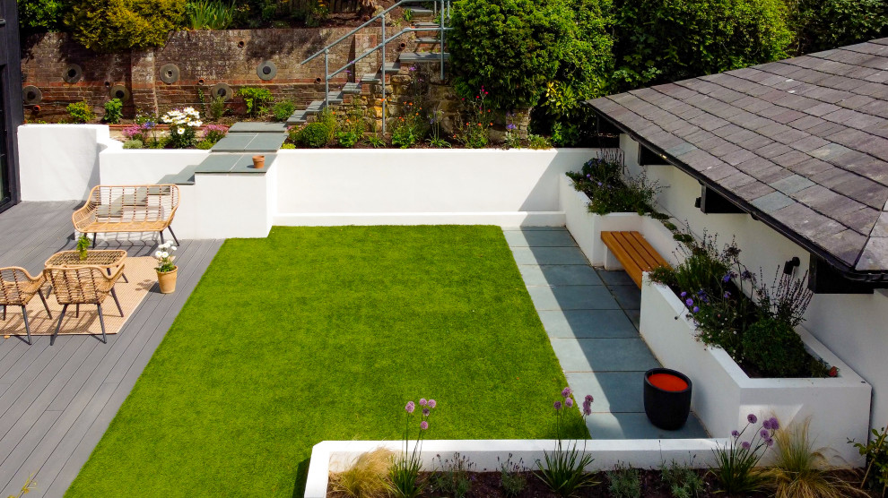 Inspiration for a medium sized contemporary roof formal full sun garden wall for summer in Kent with a retaining wall.