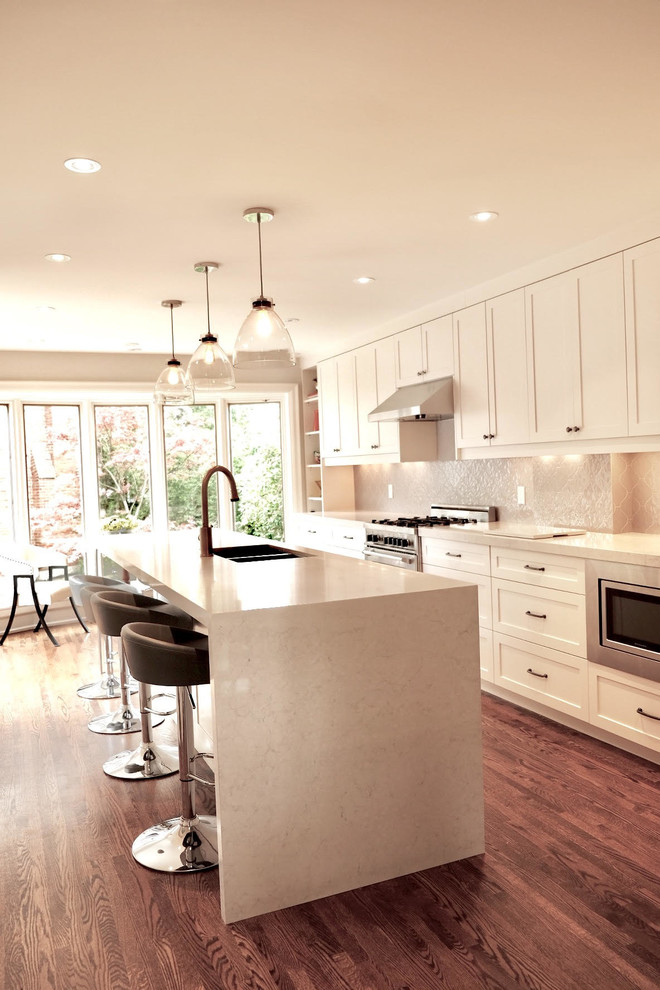 Example of a transitional kitchen design in Toronto