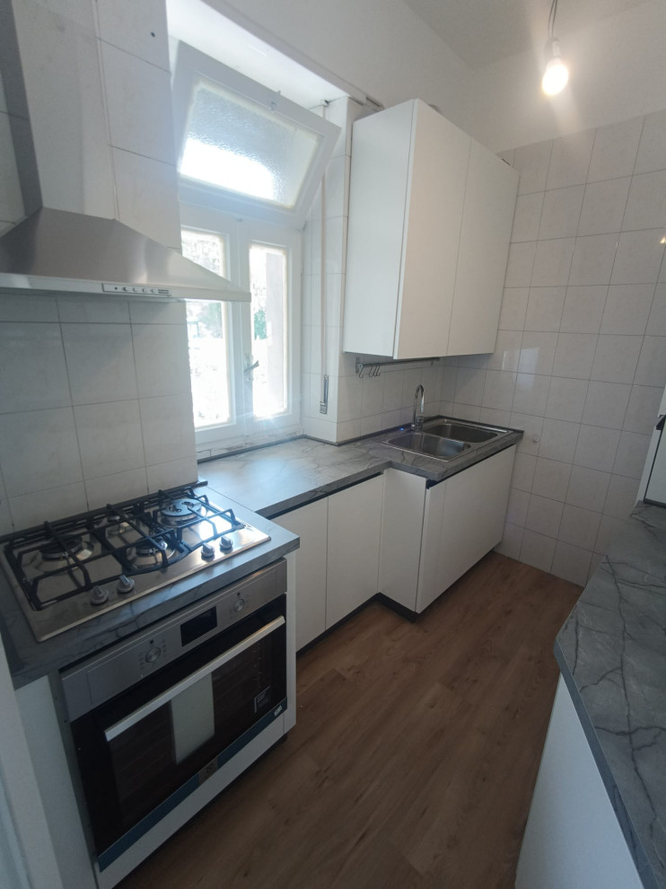 Restyling Cucina Ante Utopia Bianco e Top Grey Yule