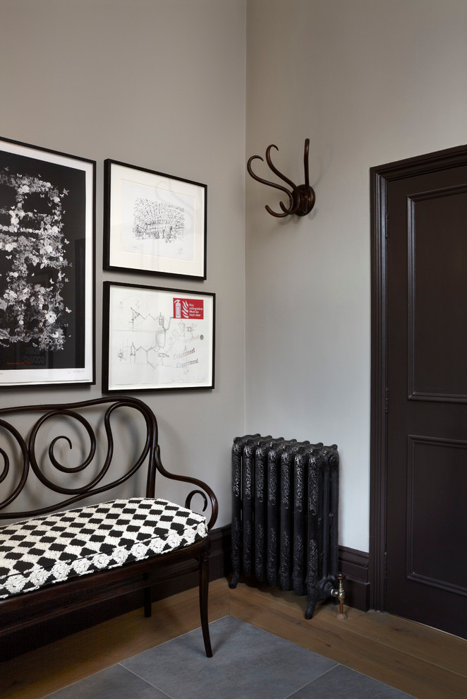 Design ideas for a traditional foyer in London with grey walls.