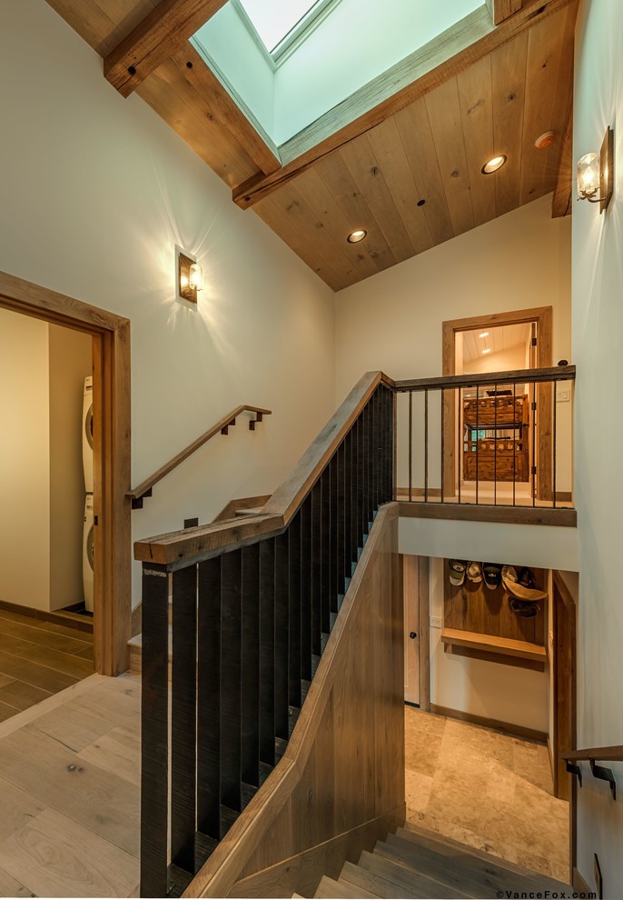 Mid-sized country wood u-shaped staircase in San Francisco with wood risers.
