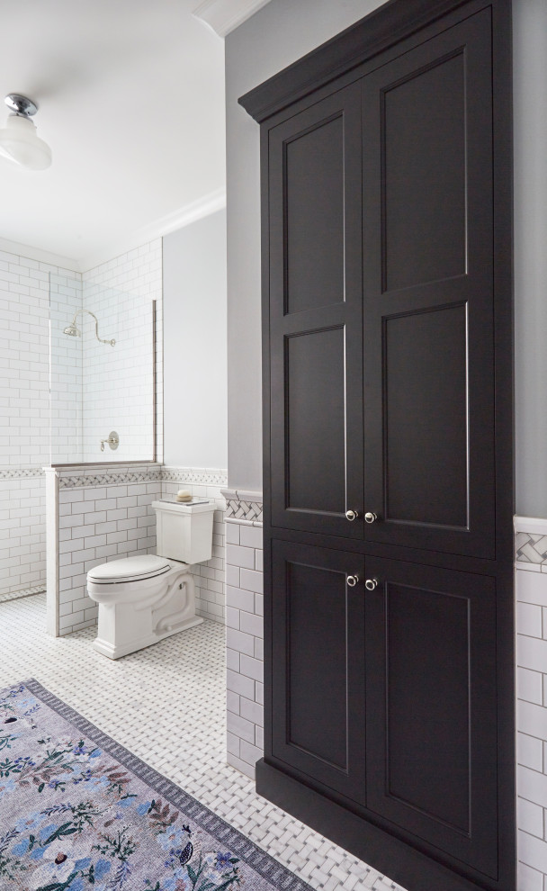 This is an example of a mid-sized traditional master bathroom in Chicago with shaker cabinets, grey cabinets, a freestanding tub, an open shower, a one-piece toilet, white tile, cement tile, grey walls, mosaic tile floors, a drop-in sink, quartzite benchtops, white floor, an open shower, white benchtops, a single vanity and a built-in vanity.