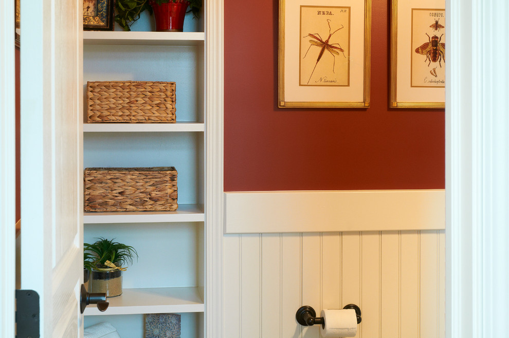 Inspiration for a small transitional bathroom remodel with red walls