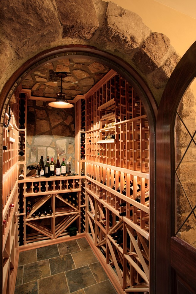 Inspiration for a mediterranean wine cellar in Charlotte.