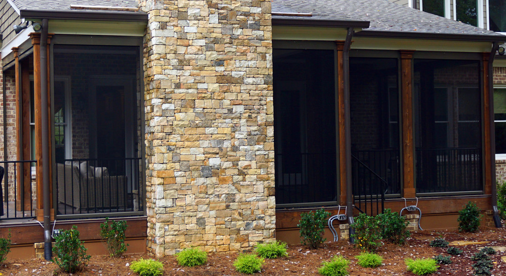 Example of a mountain style home design design in Atlanta
