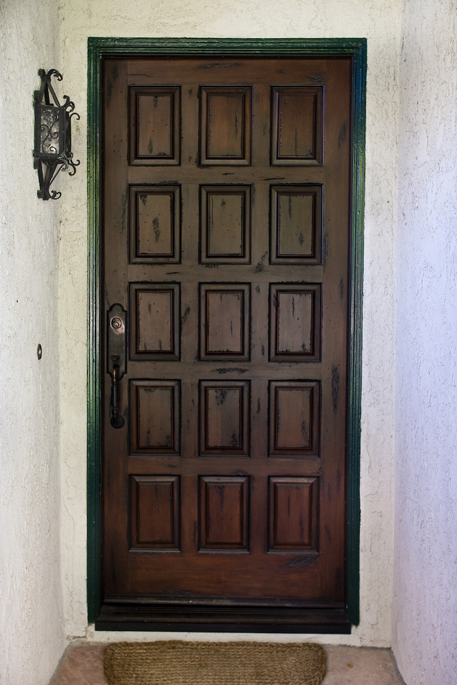 Example of a tuscan entryway design in Orange County