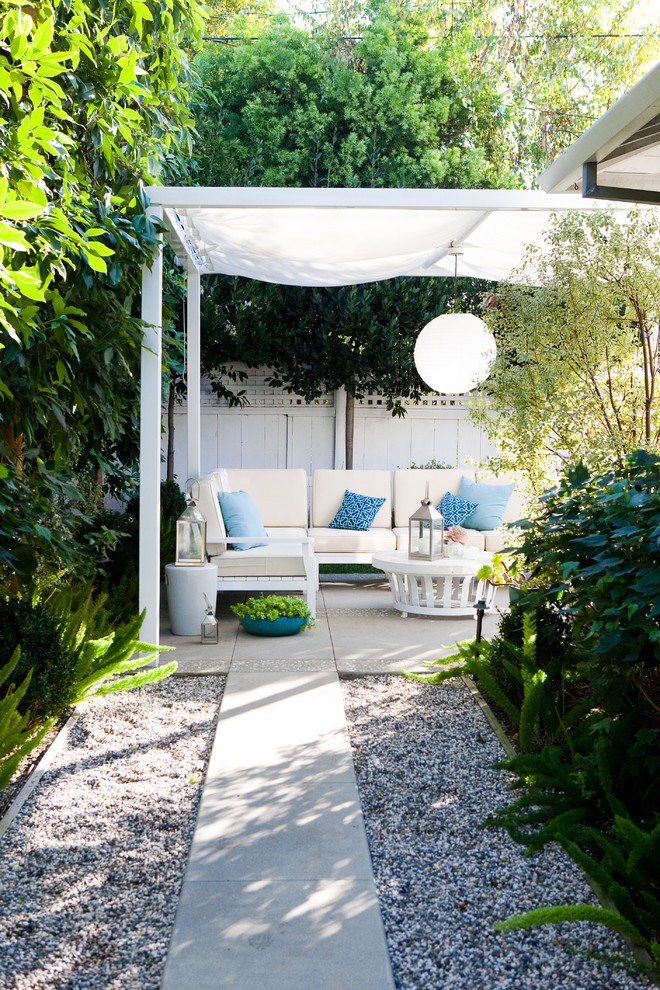 Inspiration for a traditional patio in Los Angeles with a gazebo/cabana.