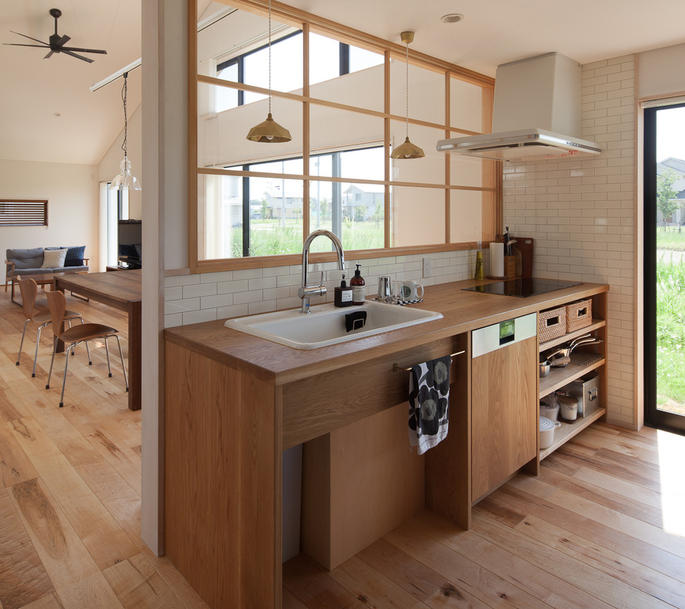 他の地域にある北欧スタイルのおしゃれなキッチンの写真