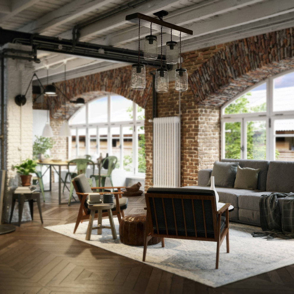 Inspiration for a mid-sized industrial formal loft-style living room in San Francisco with dark hardwood floors and brown floor.