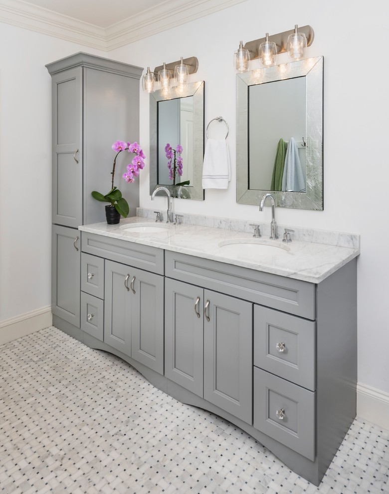 Mid-sized transitional 3/4 bathroom in Providence with recessed-panel cabinets, grey cabinets, ceramic floors, an undermount sink, marble benchtops and grey floor.