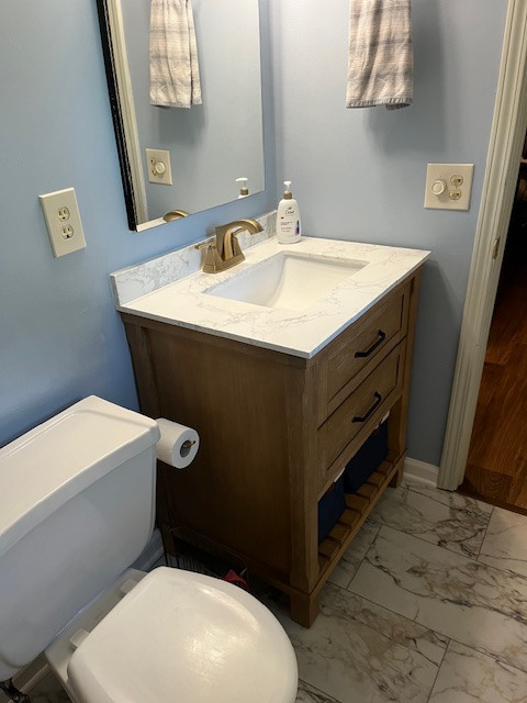 Bathroom with full tile shower