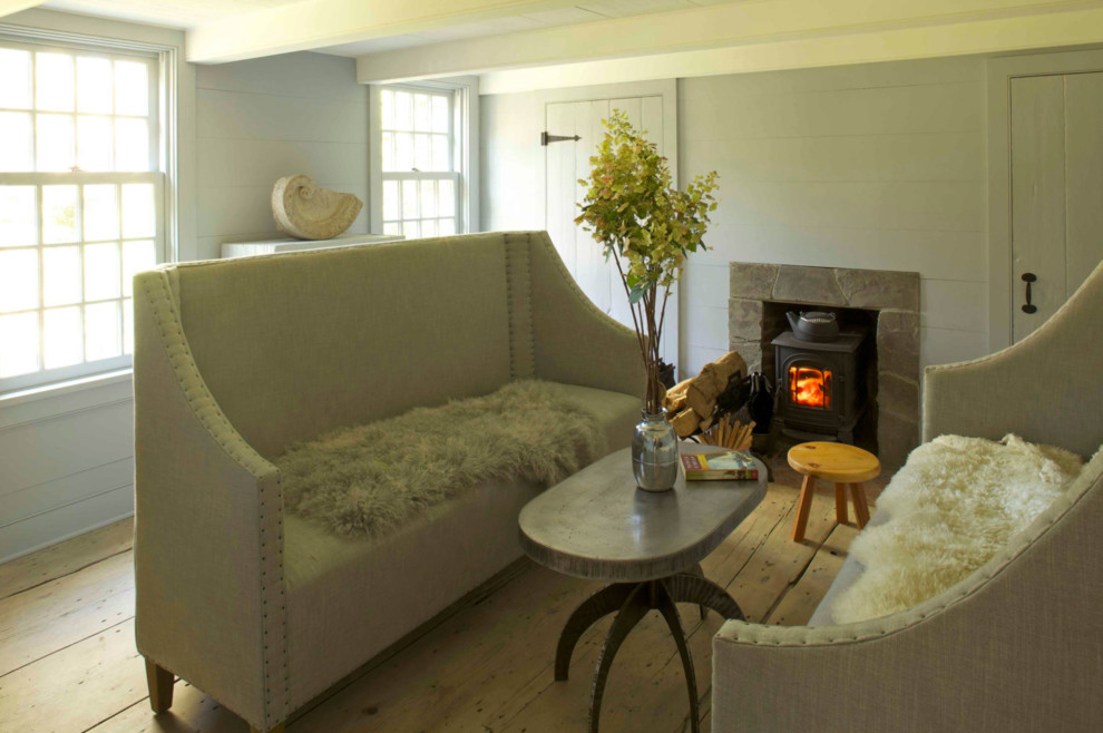 Inspiration for a mid-sized country formal open concept living room in Providence with white walls, carpet, a standard fireplace, a tile fireplace surround, no tv and beige floor.