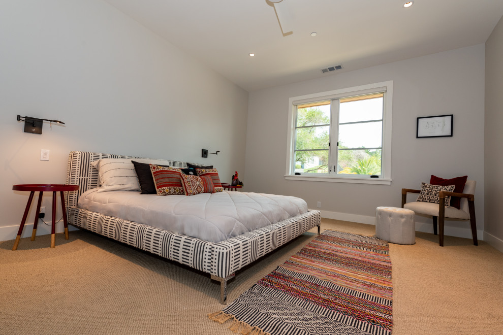 Bedroom - large country guest carpeted and beige floor bedroom idea in San Francisco with gray walls