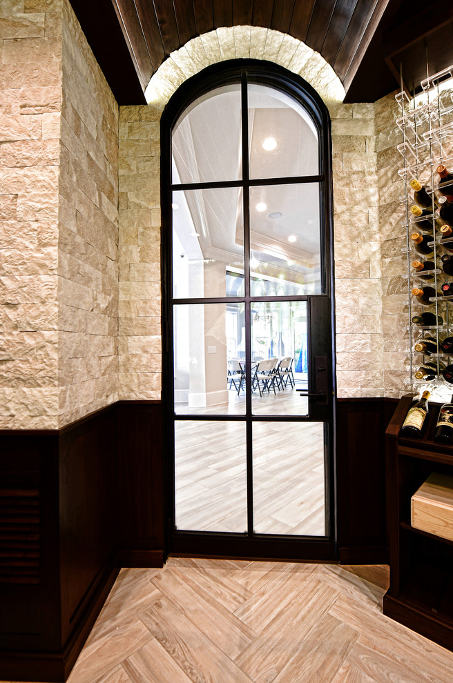 Design ideas for a mid-sized transitional wine cellar in Atlanta with porcelain floors, display racks and multi-coloured floor.