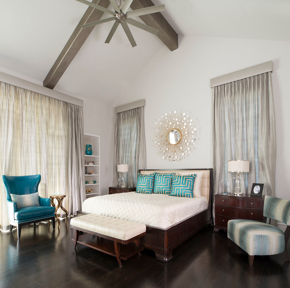 Inspiration for a traditional bedroom in Dallas with white walls and dark hardwood floors.