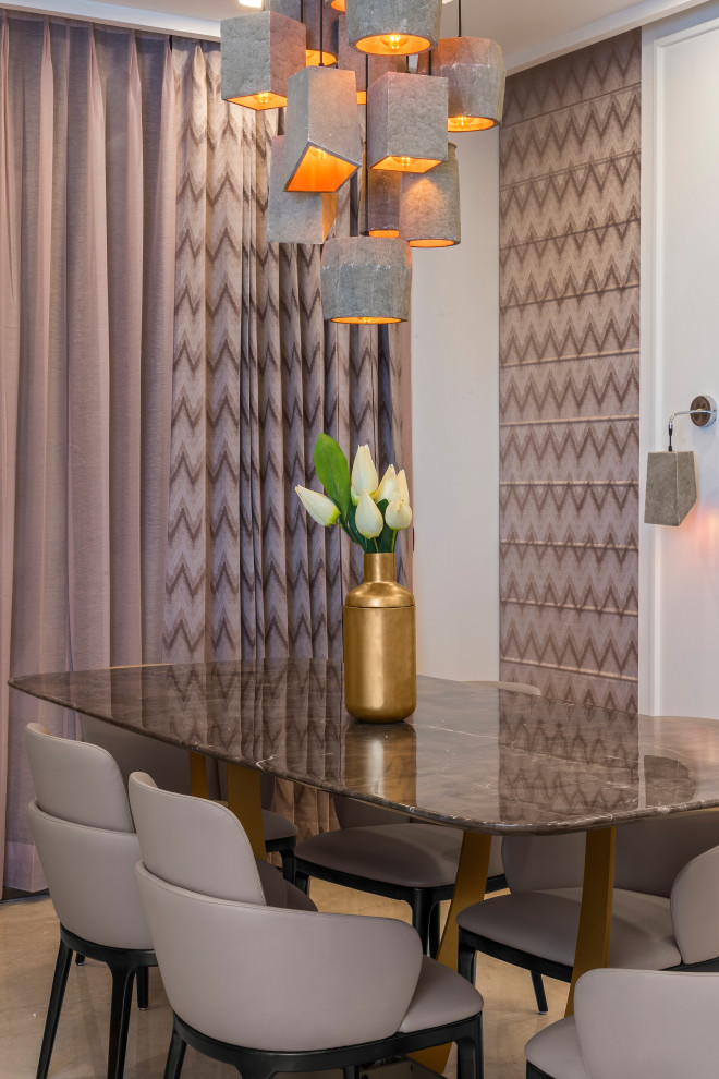 This is an example of a contemporary dining room in Delhi.