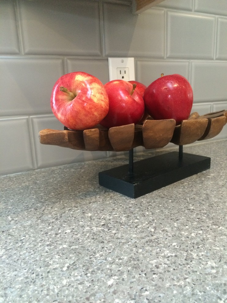 Example of a transitional kitchen design in Calgary