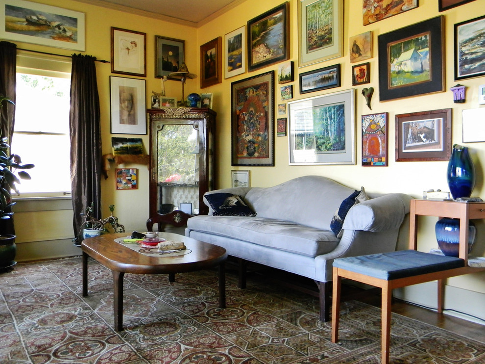 Photo of a traditional living room in Portland with yellow walls.