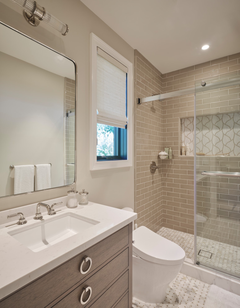 Design ideas for a mid-sized country bathroom in San Francisco with flat-panel cabinets, brown cabinets, an alcove tub, a shower/bathtub combo, brown tile, subway tile, beige walls, porcelain floors, an undermount sink, engineered quartz benchtops, multi-coloured floor, a sliding shower screen, white benchtops, a single vanity, a built-in vanity and a niche.