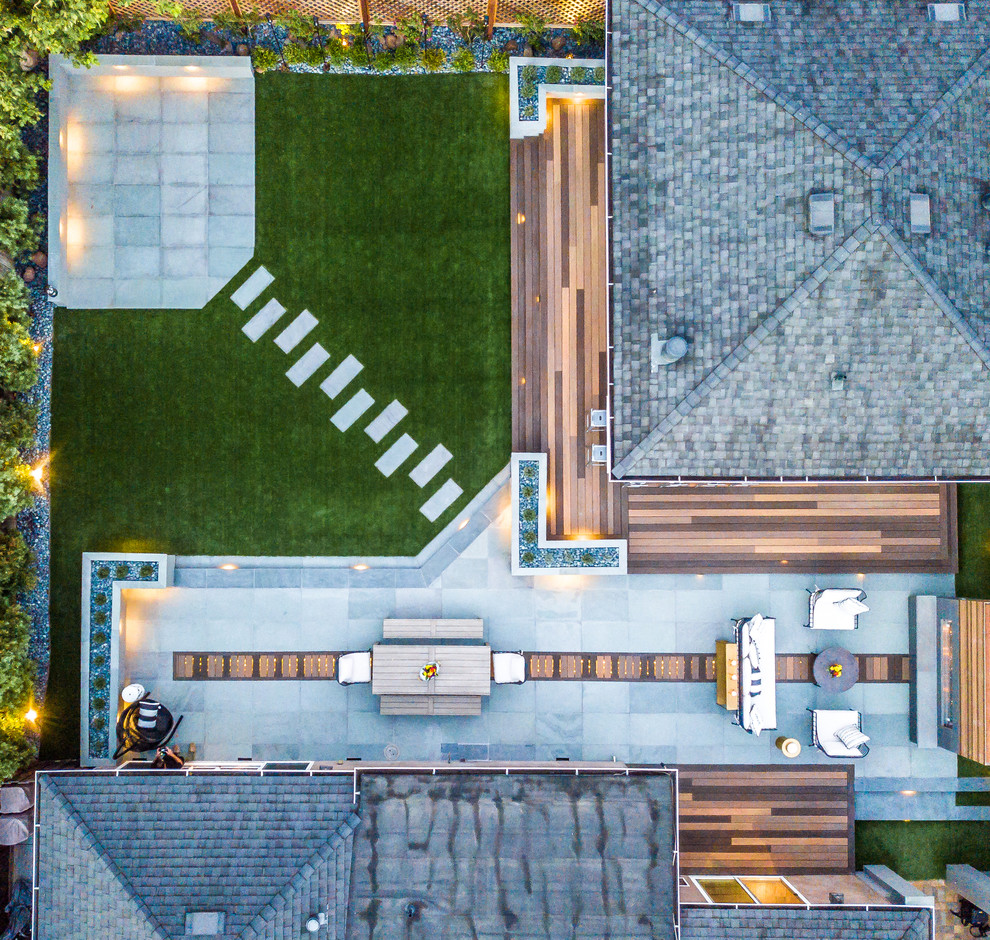 Mid-sized minimalist backyard stone patio photo in San Francisco