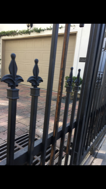 Wrought Iron Fence Renewed & Repainted.