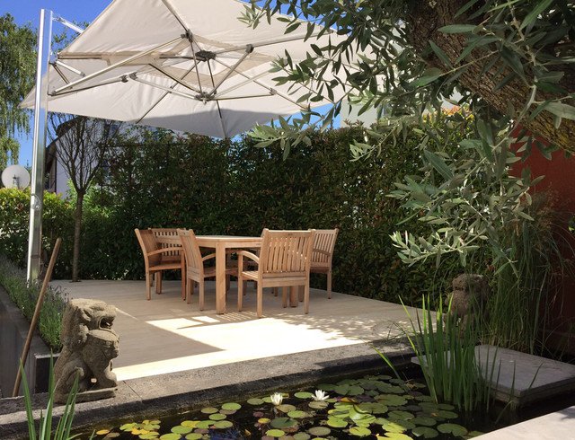 Terrasse mit Sonnenschutz contemporary-deck