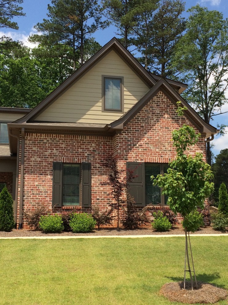 Design ideas for a traditional brick red exterior in Atlanta.