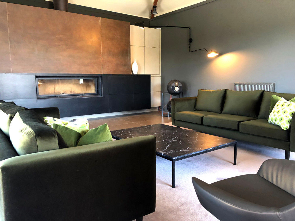Inspiration for a contemporary living room in Canberra - Queanbeyan with a tile fireplace surround.