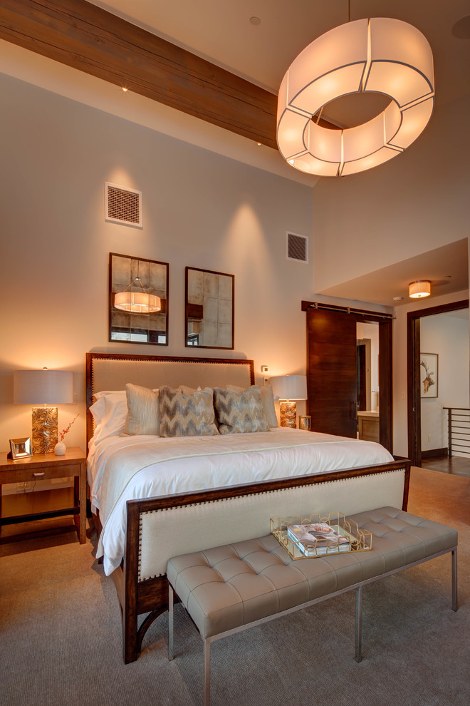 This is an example of a large contemporary bedroom in Salt Lake City.