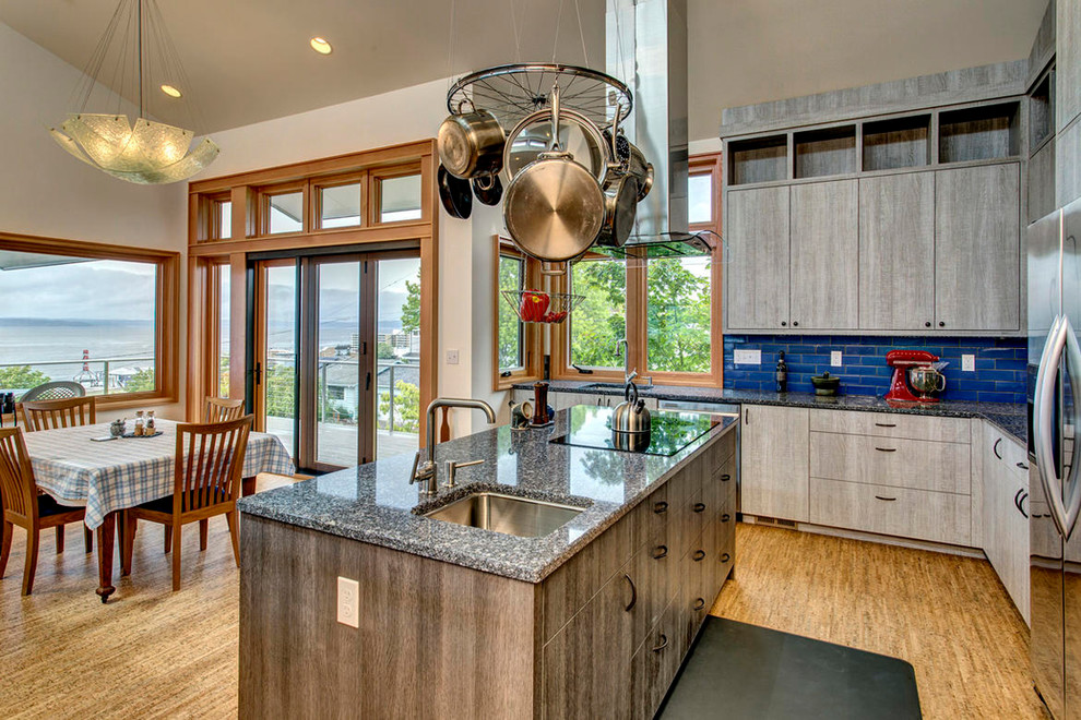 Photo of a contemporary l-shaped eat-in kitchen in Seattle with blue splashback and with island.