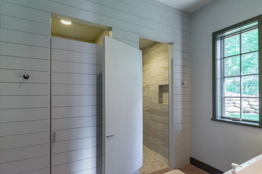 Inspiration for a mid-sized country kids bathroom in Birmingham with shaker cabinets, green cabinets, an open shower, a one-piece toilet, gray tile, porcelain tile, green walls, concrete floors, a trough sink, engineered quartz benchtops, orange floor and a hinged shower door.