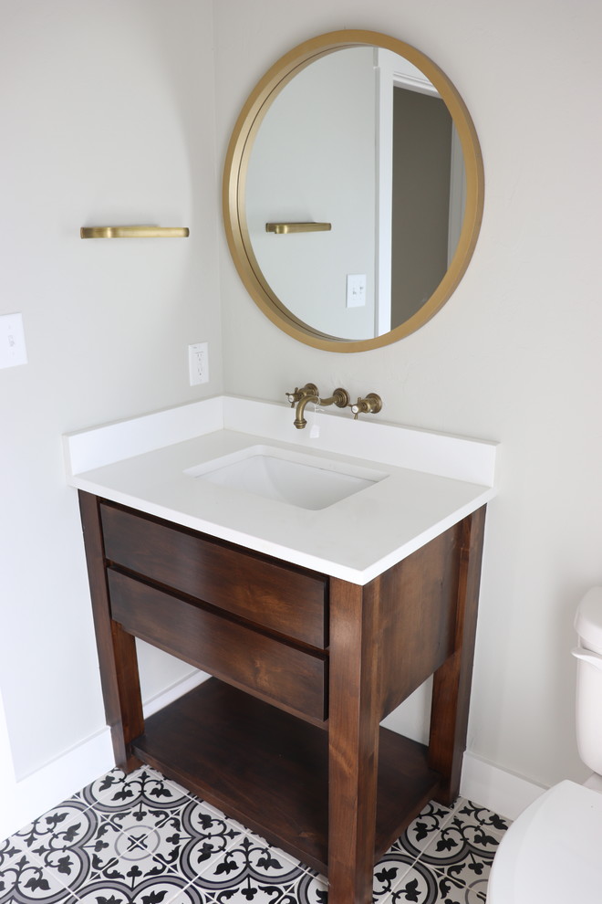 Photo of a large contemporary 3/4 bathroom in Dallas with furniture-like cabinets, medium wood cabinets, beige walls, ceramic floors, engineered quartz benchtops, black floor and white benchtops.