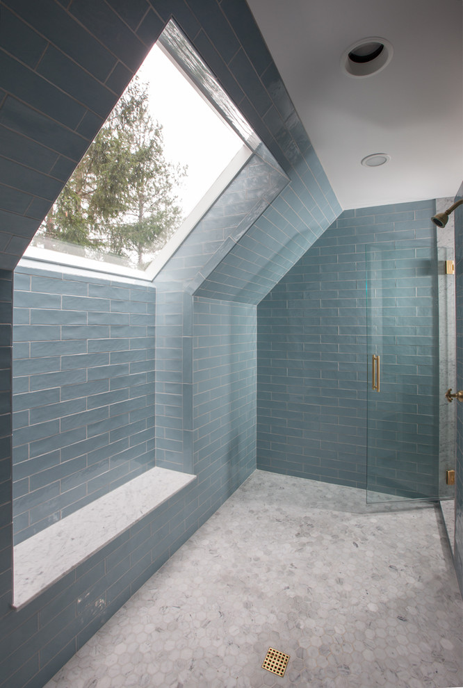 This is an example of a mid-sized transitional master bathroom in Portland with flat-panel cabinets, white cabinets, a double shower, blue tile, cement tile, white walls, marble floors, an undermount sink and engineered quartz benchtops.