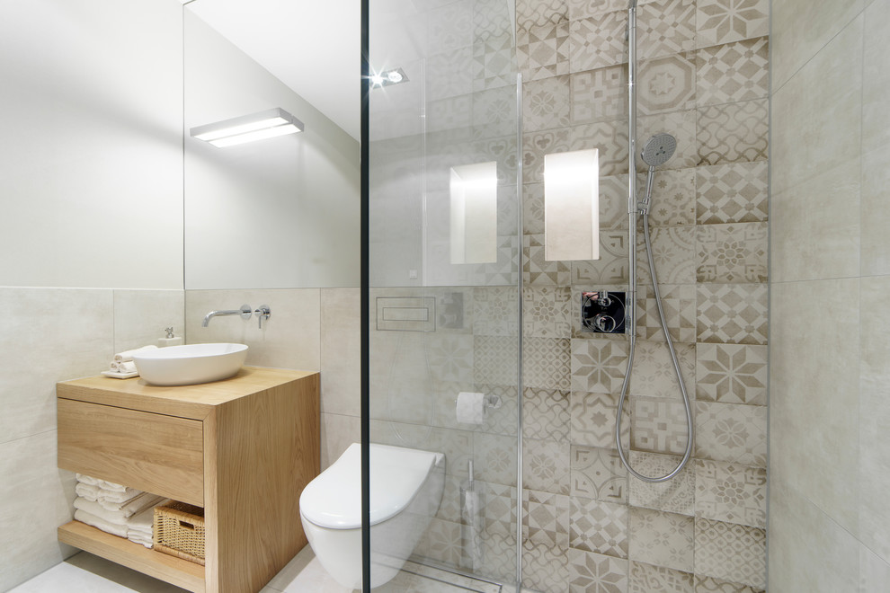 This is an example of a medium sized contemporary shower room bathroom in Leipzig with a built-in shower and an open shower.