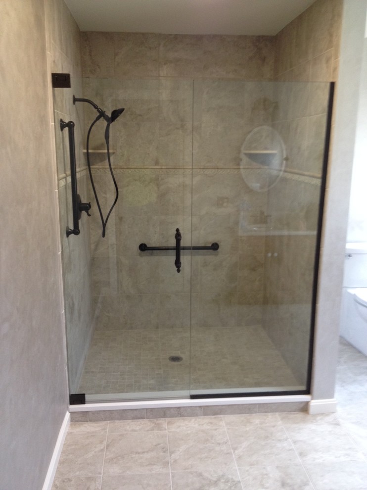 Transitional 3/4 beige tile and ceramic tile ceramic tile and beige floor alcove shower photo with beige walls and a hinged shower door