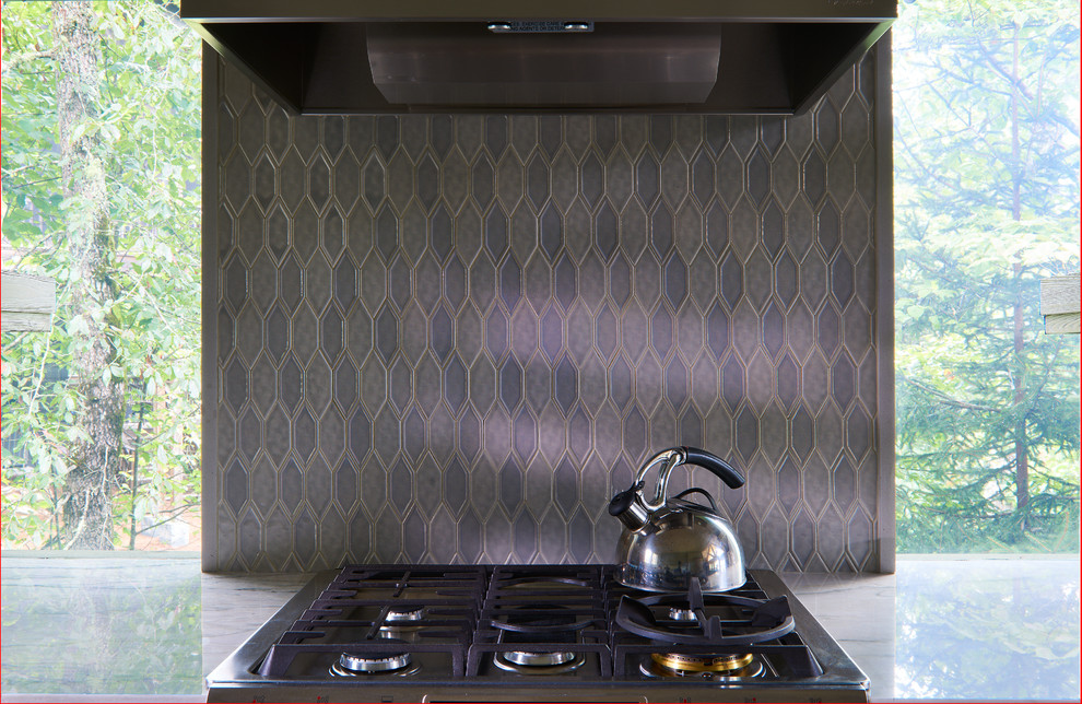 Eat-in kitchen - small transitional single-wall medium tone wood floor, brown floor and vaulted ceiling eat-in kitchen idea with an undermount sink, recessed-panel cabinets, gray cabinets, granite countertops, multicolored backsplash, ceramic backsplash, stainless steel appliances, an island and turquoise countertops