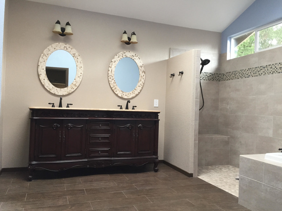Mid-sized southwest master multicolored tile and ceramic tile light wood floor bathroom photo in San Francisco with raised-panel cabinets, white cabinets, a one-piece toilet, white walls, an integrated sink and wood countertops