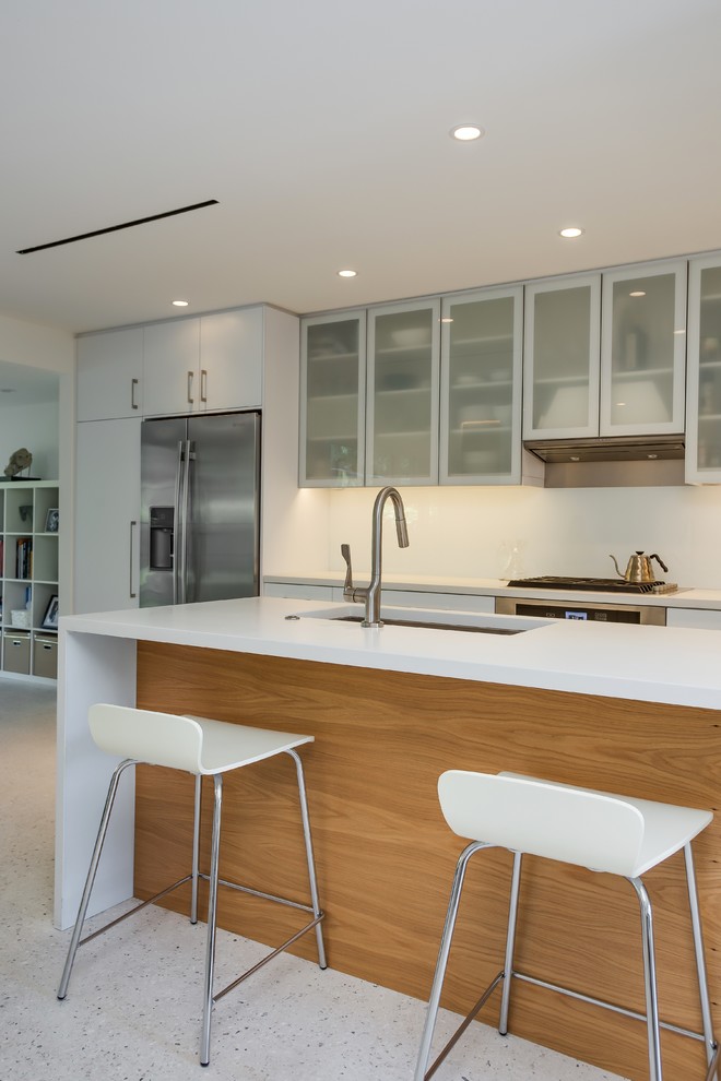 Inspiration for a modern kitchen in Tampa with concrete benchtops.