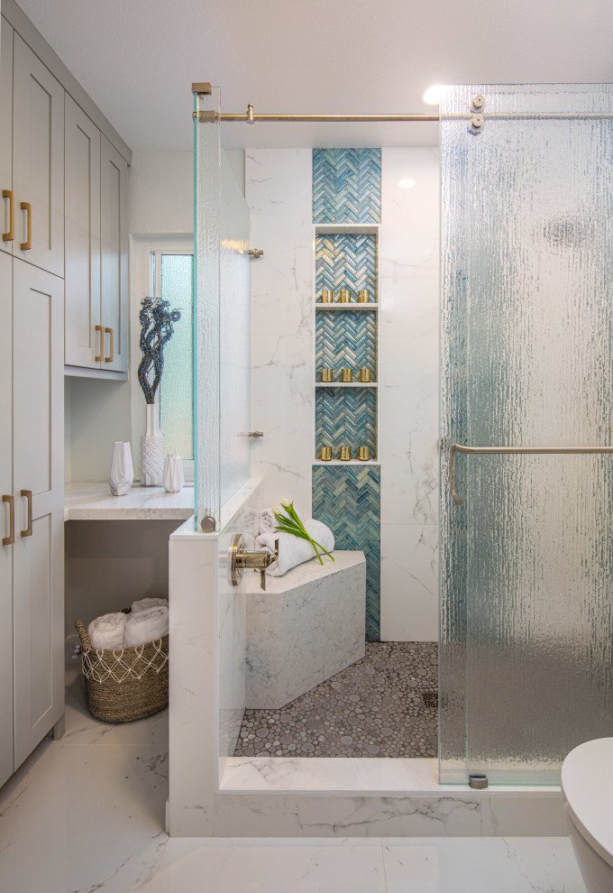 Large transitional master wet room bathroom in San Diego with dark wood cabinets, a one-piece toilet, blue tile, white walls, a vessel sink, engineered quartz benchtops, green floor, a hinged shower door, white benchtops and shaker cabinets.