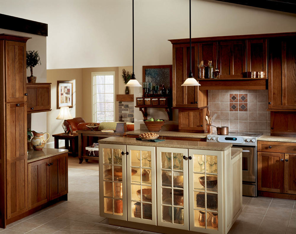 Inspiration for an expansive traditional kitchen in Denver with brown cabinets, quartz benchtops and with island.
