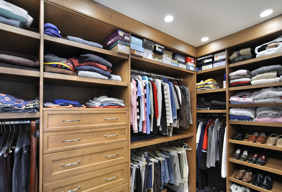 Traditional gender-neutral storage and wardrobe in Miami with open cabinets and medium wood cabinets.