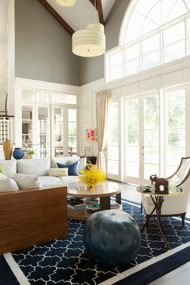 Inspiration for a transitional family room in Los Angeles with grey walls.