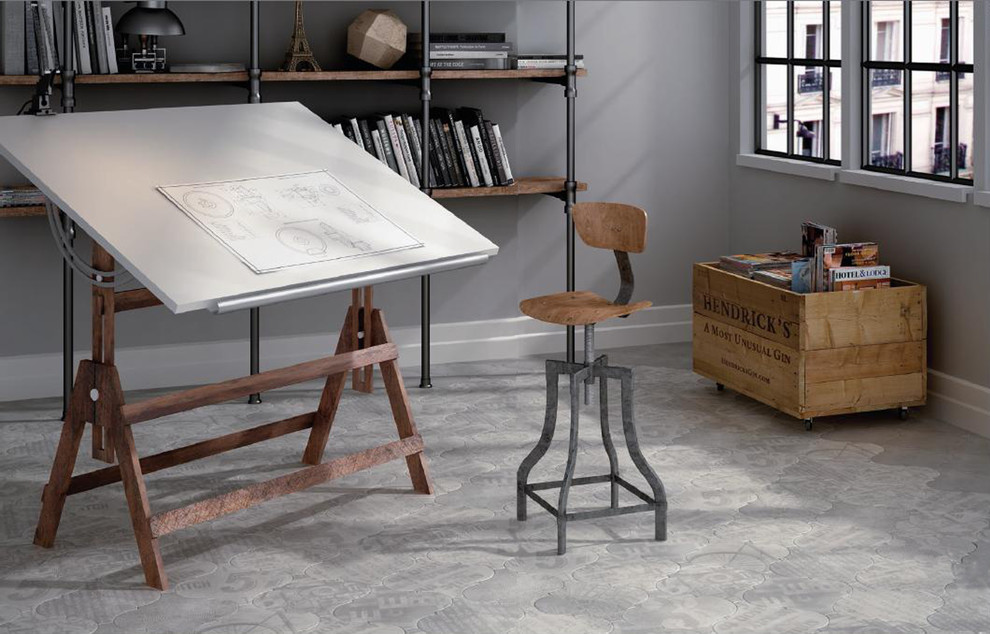Design ideas for a transitional home office in Toronto with porcelain floors.