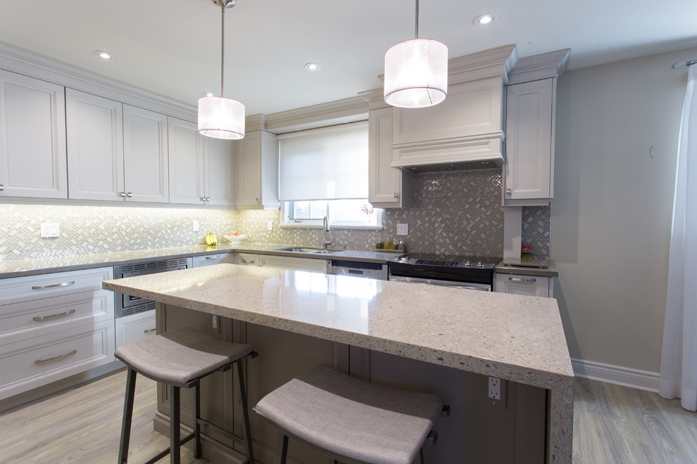 Example of a transitional kitchen design in Toronto