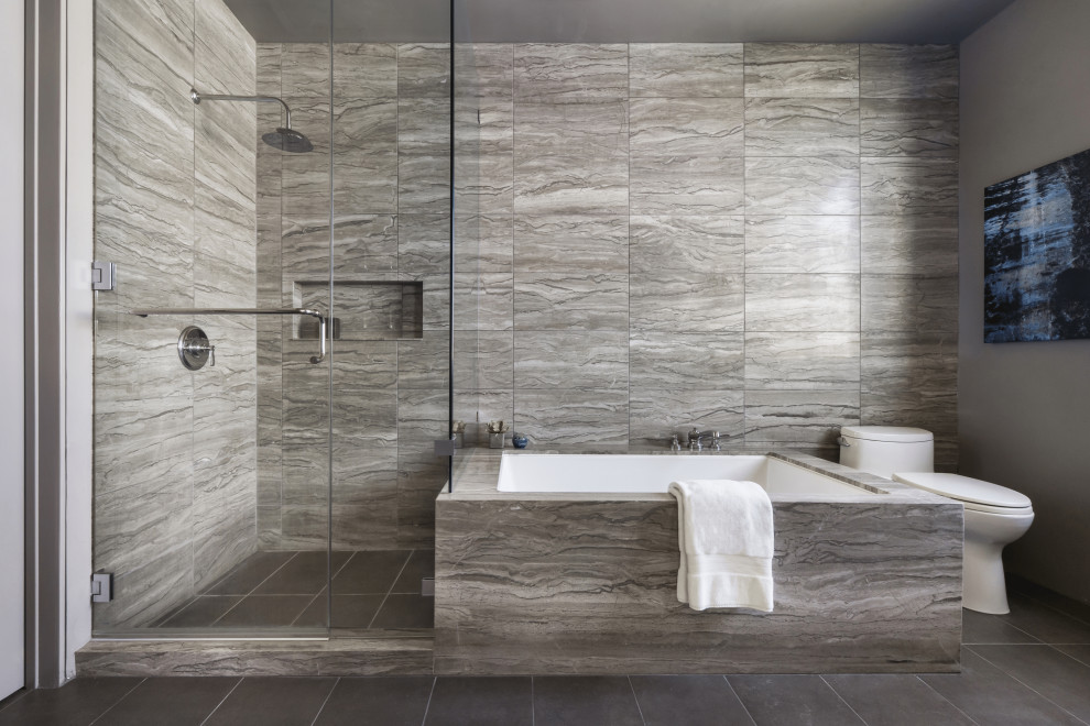 Photo of a mid-sized contemporary bathroom in San Francisco with flat-panel cabinets, grey cabinets, a drop-in tub, a shower/bathtub combo, a one-piece toilet, marble floors, with a sauna, an undermount sink, granite benchtops, a hinged shower door and a single vanity.