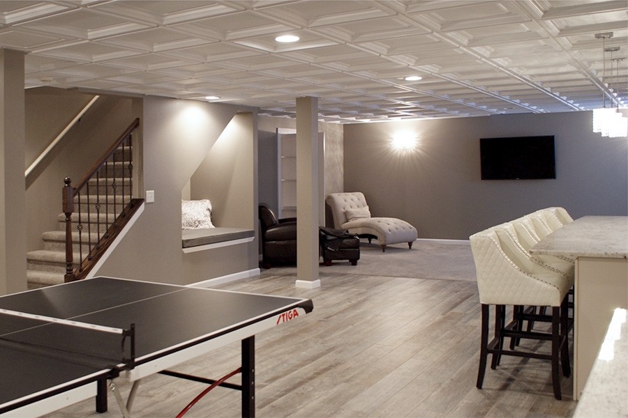 Basement Ceiling Options - Basement Ceiling Ideas - 11 Stylish Options - Bob Vila : One unique way to brighten up the area is by installing some pipe lamps on the ceiling.