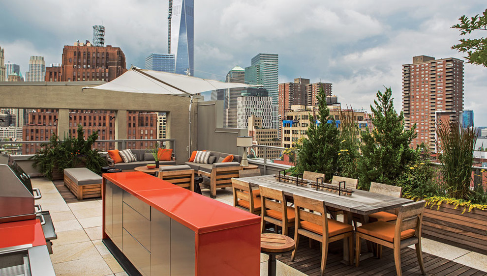 Design ideas for a contemporary rooftop and rooftop deck in New York with an outdoor kitchen and no cover.