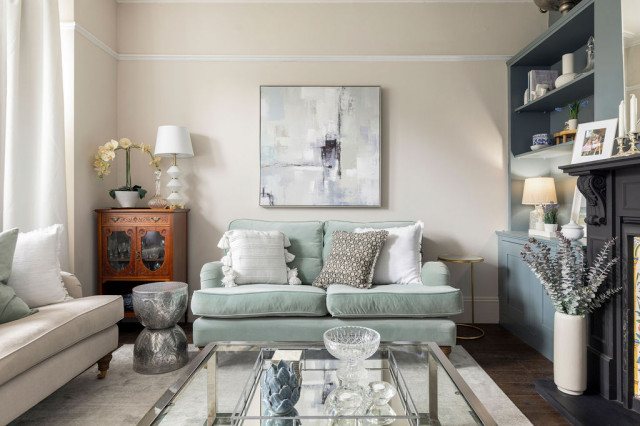 Calm & serene living room with a mix of chrome & brass metal accents traditional-living-room