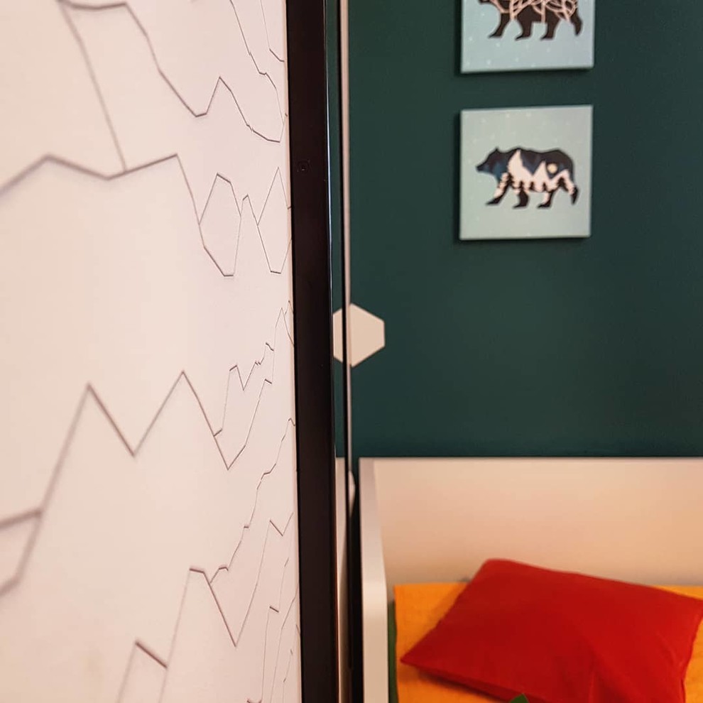 Small scandinavian kids' room in Other with green walls, laminate floors and beige floor for boys.